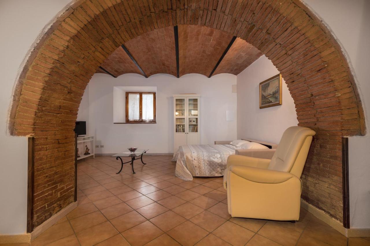 מונטריג'יוני Enchanting Flat With Patio In Abbadia A Isola מראה חיצוני תמונה