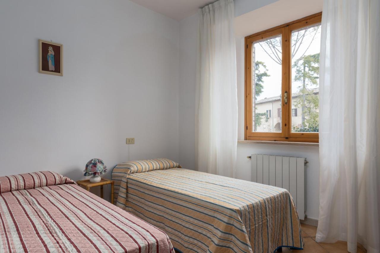מונטריג'יוני Enchanting Flat With Patio In Abbadia A Isola מראה חיצוני תמונה